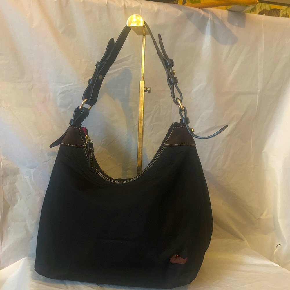 Dooney & Bourke black canvas shoulder bag magenta 2 compartment interior